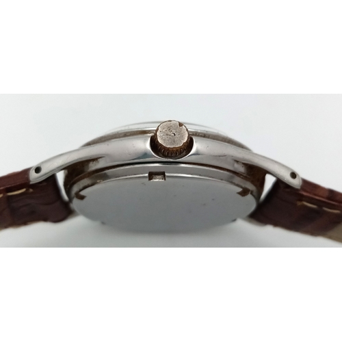 17 - A Vintage Omega Mechanical (hand-wind) Gents Watch. Brown leather strap. Stainless steel case - 34mm... 