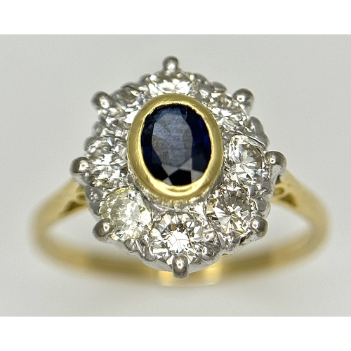 110 - AN 18K YELLOW GOLD DIAMOND & SAPPHIRE CLUSTER RING. DIAMOND WEIGHT 0.75CT. TOTAL WEIGHT 3.3G. SIZE N... 