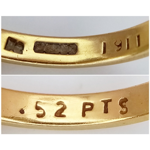 65 - An 18K Yellow Gold Opal and Diamond Ring. A 1ct central opal with a 0.52ctw diamond surround. Size N... 