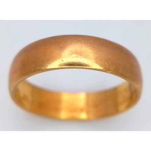 72 - A 22K Yellow Gold Band Ring. 6mm width. Full UK hallmarks. 4.35g.