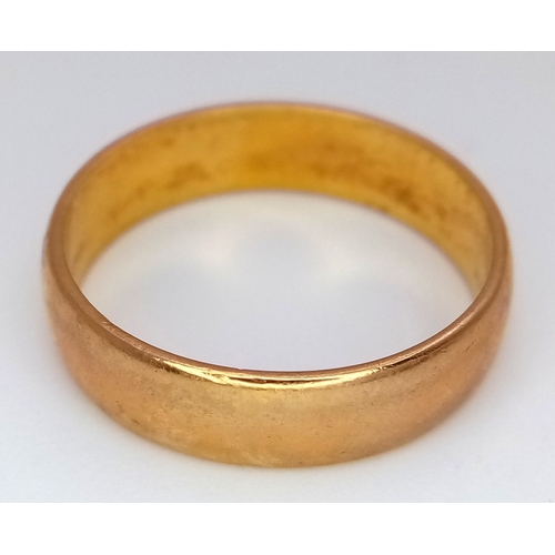 72 - A 22K Yellow Gold Band Ring. 6mm width. Full UK hallmarks. 4.35g.
