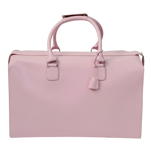 73 - An Ultra Rare Alfred Dunhill Overnight Bag in Shocking Pink! Coated pink leather exterior. Spacious ... 