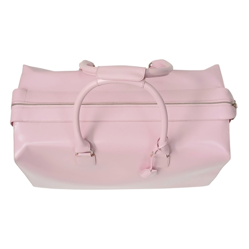 73 - An Ultra Rare Alfred Dunhill Overnight Bag in Shocking Pink! Coated pink leather exterior. Spacious ... 