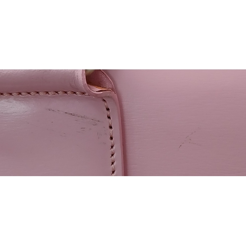 73 - An Ultra Rare Alfred Dunhill Overnight Bag in Shocking Pink! Coated pink leather exterior. Spacious ... 