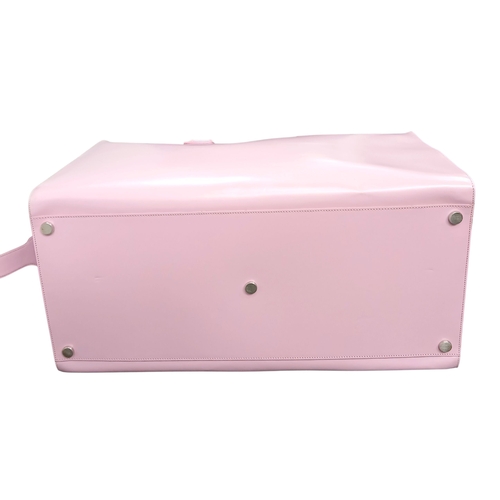 73 - An Ultra Rare Alfred Dunhill Overnight Bag in Shocking Pink! Coated pink leather exterior. Spacious ... 