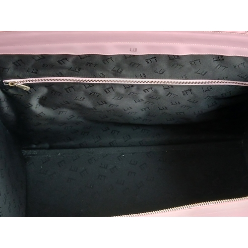 73 - An Ultra Rare Alfred Dunhill Overnight Bag in Shocking Pink! Coated pink leather exterior. Spacious ... 