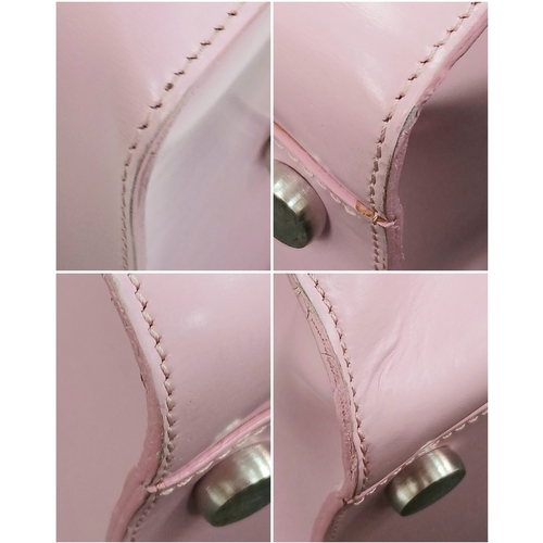 73 - An Ultra Rare Alfred Dunhill Overnight Bag in Shocking Pink! Coated pink leather exterior. Spacious ... 