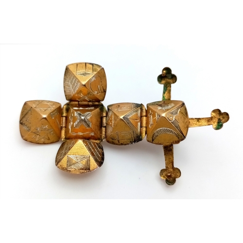 92 - A 9K Yellow Gold and Silver Masonic Ball Pendant - Opens to form a cross. 5 x 3.5cm. 7.3g.