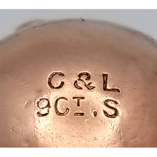 92 - A 9K Yellow Gold and Silver Masonic Ball Pendant - Opens to form a cross. 5 x 3.5cm. 7.3g.