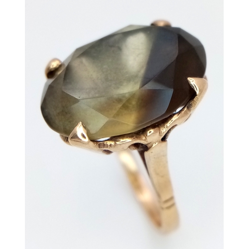 93 - A 9K Yellow Gold Smoky Quartz Ring. 5.75g.