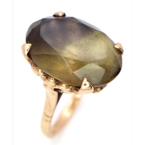 93 - A 9K Yellow Gold Smoky Quartz Ring. 5.75g.
