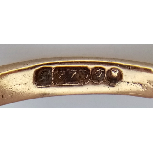 93 - A 9K Yellow Gold Smoky Quartz Ring. 5.75g.