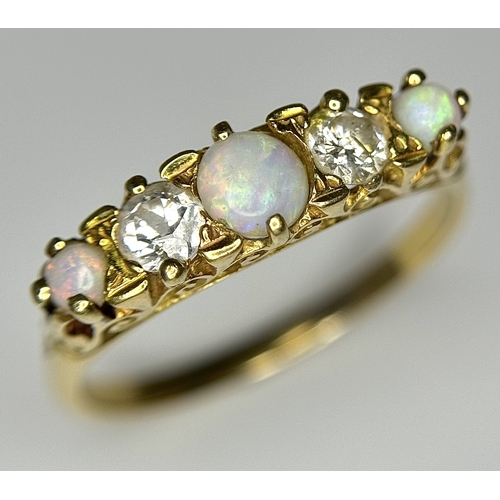 103 - A VINTAGE 18K YELLOW GOLD DIAMOND & OPAL RING. TOTAL WEIGHT 3.7G. SIZE R. TAN 8004