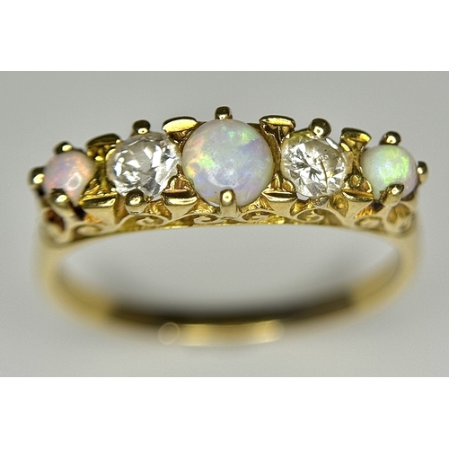 103 - A VINTAGE 18K YELLOW GOLD DIAMOND & OPAL RING. TOTAL WEIGHT 3.7G. SIZE R. TAN 8004