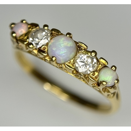 103 - A VINTAGE 18K YELLOW GOLD DIAMOND & OPAL RING. TOTAL WEIGHT 3.7G. SIZE R. TAN 8004