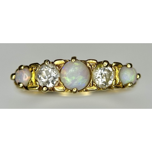 103 - A VINTAGE 18K YELLOW GOLD DIAMOND & OPAL RING. TOTAL WEIGHT 3.7G. SIZE R. TAN 8004