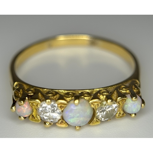 103 - A VINTAGE 18K YELLOW GOLD DIAMOND & OPAL RING. TOTAL WEIGHT 3.7G. SIZE R. TAN 8004
