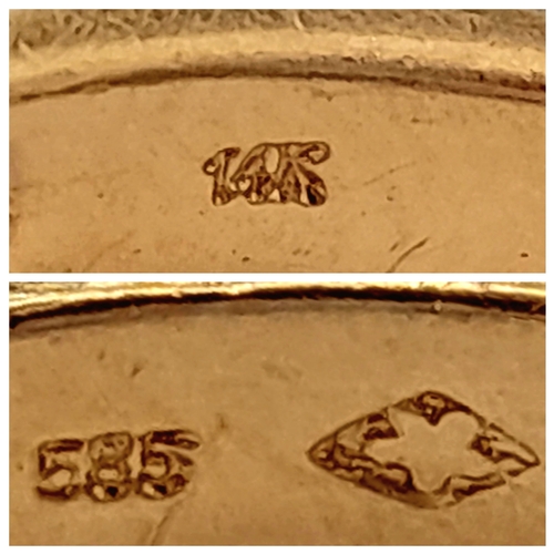 113 - A 14K YELLOW GOLD FANCY BAGUETTE DIAMOND SET CROSSOVER RING. DIAMOND WEIGHT 0.25CT. TOTAL WEIGHT 3.8... 