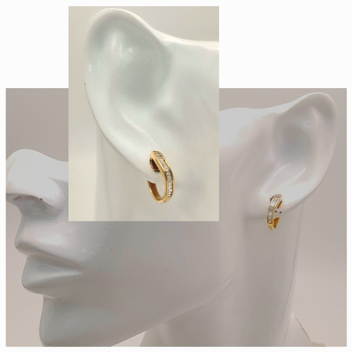 120 - A PAIR OF 18K YELOW GOLD BAGUETTE CUT DIAMOND SET HOOP EARRINGS. TOTAL WEIGHT 2.3G. DIAMOND WEIGHT 0... 