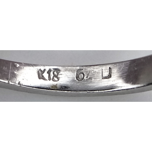 152 - A 9K WHITE GOLD DIAMOND FLORAL CLUSTER RING. DIAMOND WEIGHT 0.70CT. TOTAL WEIGHT 3G. SIZE N. SPSA 20... 