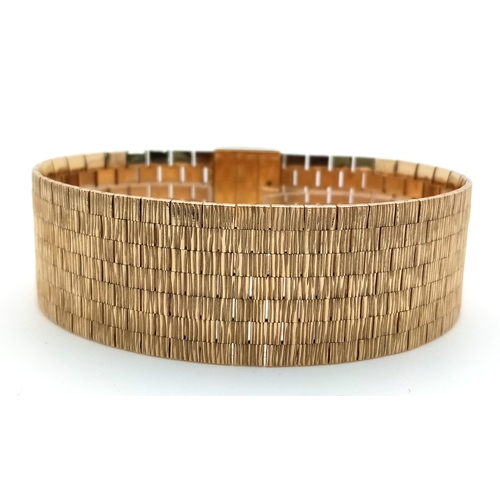 67 - A Beautiful Vintage 9K Yellow Gold Ladies Statement Bracelet. Geometric pattern links with a sturdy ... 