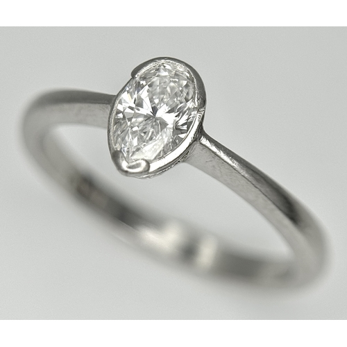 82 - A PLATINUM DIAMOND SOLITAIRE RING. DIAMOND WEIGHT 0.50CT. PEAR SHAPE CUT DIAMOND RUBOVER SET. TOTAL ... 