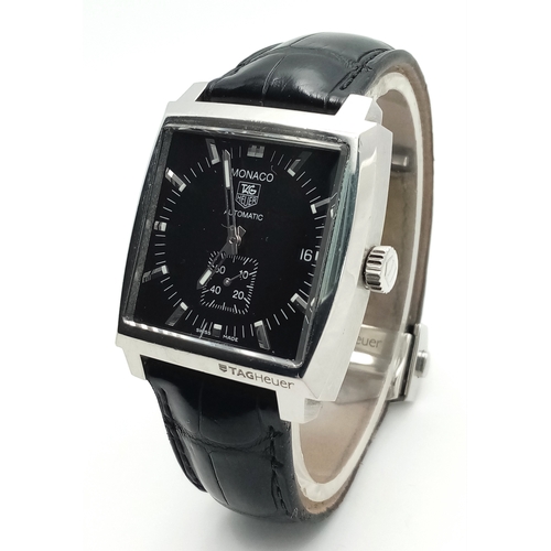 69 - A Tag Heuer Monaco Automatic Gents Watch. Model WW2110-0. Black leather strap. Stainless steel case ... 
