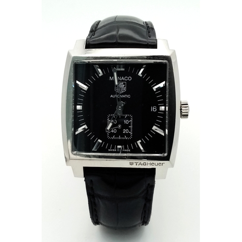 69 - A Tag Heuer Monaco Automatic Gents Watch. Model WW2110-0. Black leather strap. Stainless steel case ... 