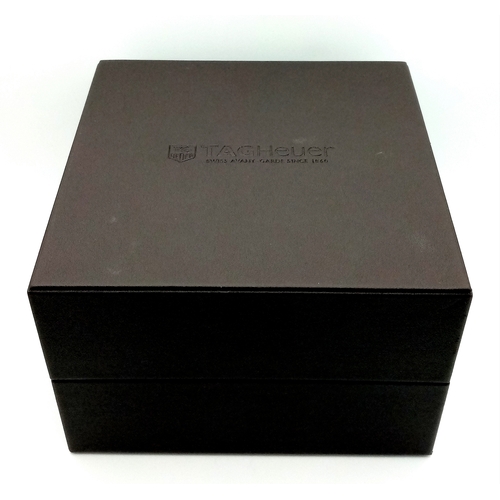 69 - A Tag Heuer Monaco Automatic Gents Watch. Model WW2110-0. Black leather strap. Stainless steel case ... 