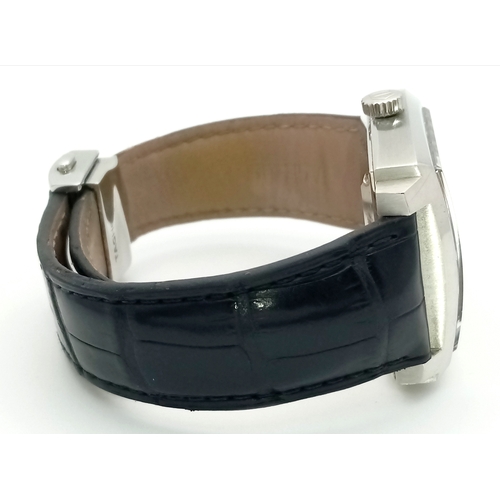 69 - A Tag Heuer Monaco Automatic Gents Watch. Model WW2110-0. Black leather strap. Stainless steel case ... 