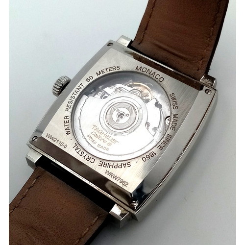 69 - A Tag Heuer Monaco Automatic Gents Watch. Model WW2110-0. Black leather strap. Stainless steel case ... 