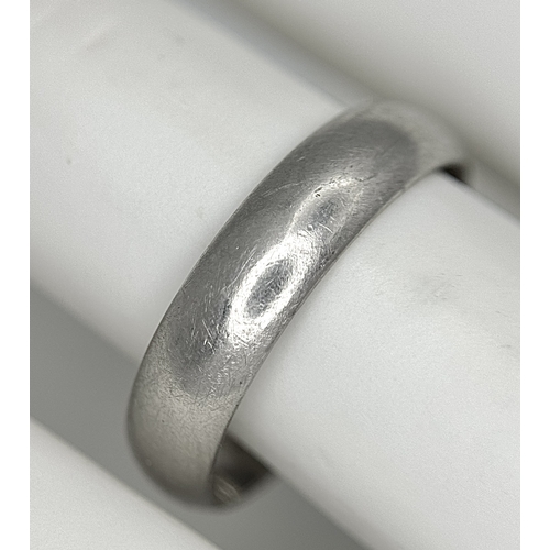 104 - A Cartier 950 Platinum Band Ring. Size T 1/2. 6.65g. Comes with a certificate. Ref: STK024166