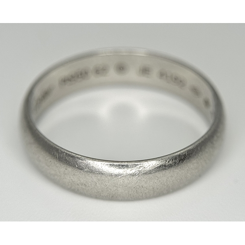 104 - A Cartier 950 Platinum Band Ring. Size T 1/2. 6.65g. Comes with a certificate. Ref: STK024166