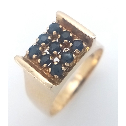 105 - Beautiful 9 CARAT GOLD RING  WITH SAPPHIRES to top IN MODERNIST SETTING. 4.35 Grams. Size M-M 1/2.