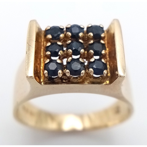 105 - Beautiful 9 CARAT GOLD RING  WITH SAPPHIRES to top IN MODERNIST SETTING. 4.35 Grams. Size M-M 1/2.