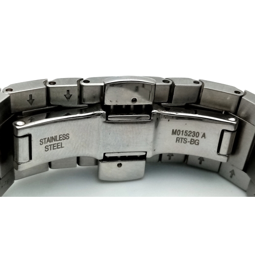181 - A Mido Automatic Ladies Watch. Model M015230A. Stainless steel bracelet and case - 32mm. Black textu... 