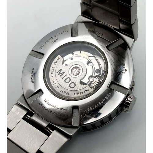 181 - A Mido Automatic Ladies Watch. Model M015230A. Stainless steel bracelet and case - 32mm. Black textu... 