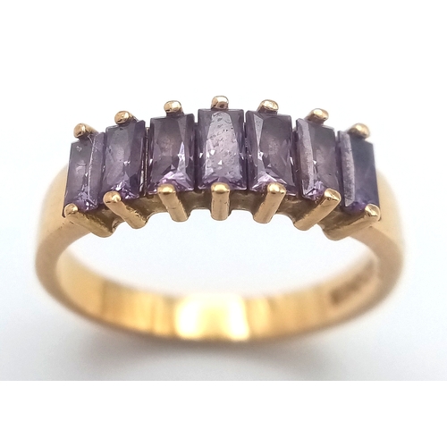 28 - Stunning 18 CARAT GOLD RING,  set with 7 x Baguette Cut AMETHYST GEMSTONES. 3.18 Grams. Size J - J 1... 