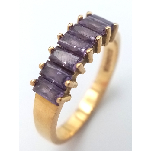 28 - Stunning 18 CARAT GOLD RING,  set with 7 x Baguette Cut AMETHYST GEMSTONES. 3.18 Grams. Size J - J 1... 