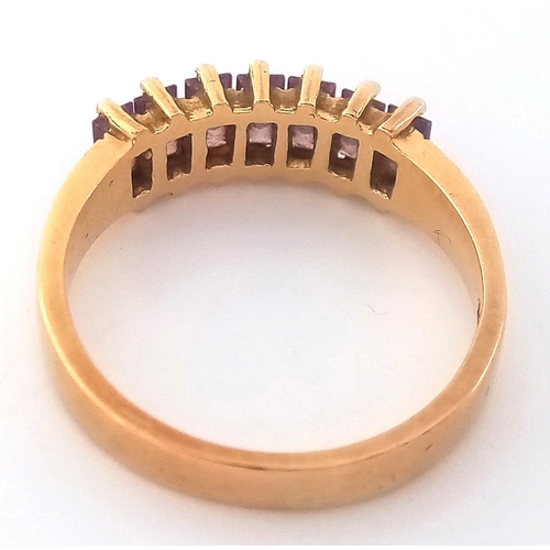 28 - Stunning 18 CARAT GOLD RING,  set with 7 x Baguette Cut AMETHYST GEMSTONES. 3.18 Grams. Size J - J 1... 