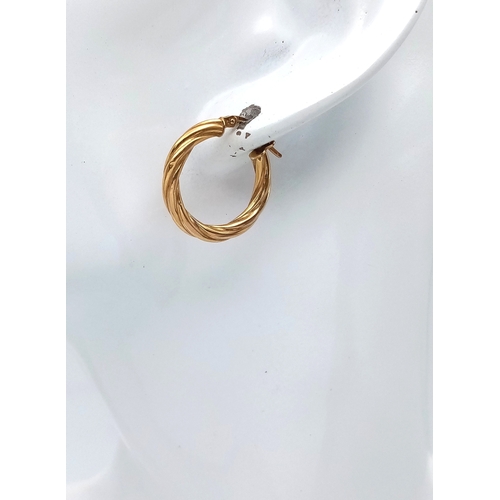 177 - A PAIR OF 9K GOLD CREOLE HOOP EARRINGS.   1.3gms