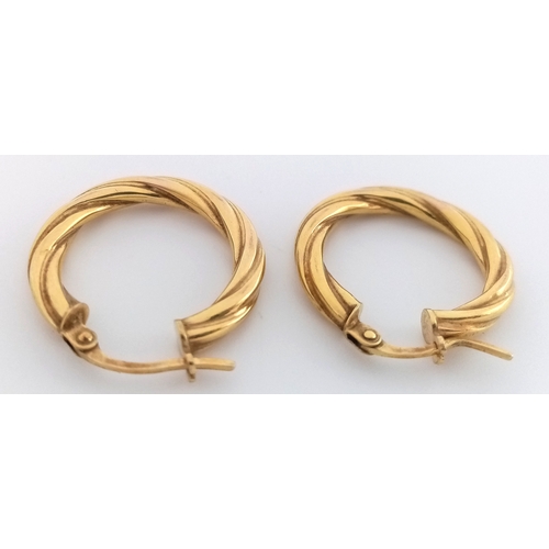 177 - A PAIR OF 9K GOLD CREOLE HOOP EARRINGS.   1.3gms