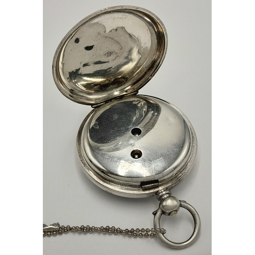 63 - Antique SILVER POCKET WATCH. Complete with winding key. Swiss hallmark. Full working order. Please s... 
