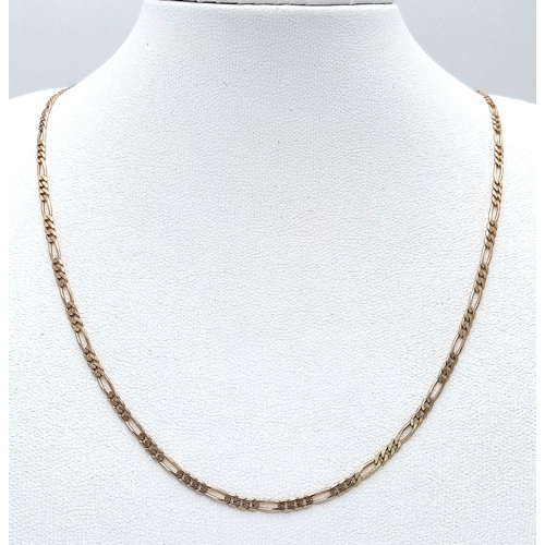142 - A 9K GOLD FIGARO LINK NECKLACE CHAIN .    4.5gms     56cms