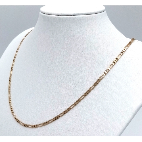 142 - A 9K GOLD FIGARO LINK NECKLACE CHAIN .    4.5gms     56cms