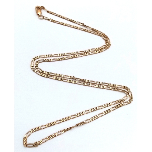 142 - A 9K GOLD FIGARO LINK NECKLACE CHAIN .    4.5gms     56cms