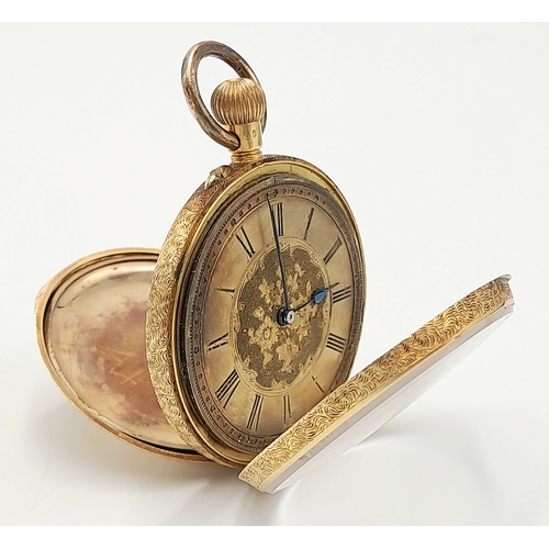 81 - AN EARLY 20TH CENTURY 18K GOLD FRENCH LADIES POCKET WATCH WITH HAND CHASED CASE AND ORNATE FLORAL DE... 