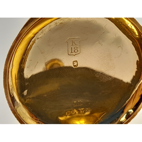 81 - AN EARLY 20TH CENTURY 18K GOLD FRENCH LADIES POCKET WATCH WITH HAND CHASED CASE AND ORNATE FLORAL DE... 