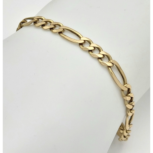 74 - A 9K GOLD FIGARO LINK BRACELET.  Weight  6.2gms ,  20cms