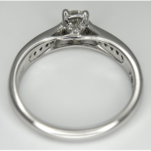 83 - An 18k white gold diamond solitaire with diamond shoulders ring, 0.50ct diamond weight, 2.9g total w... 